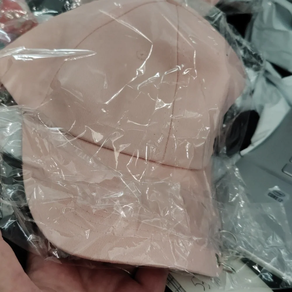 Pink pierced baseball cap